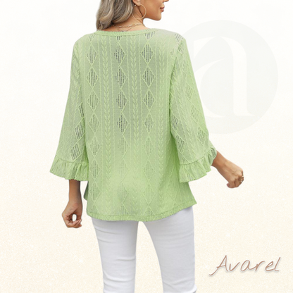 Stilvolls Oberteil mit Rautenkaromuster, elegante Hoaldetails und trendy Trompetenärmel