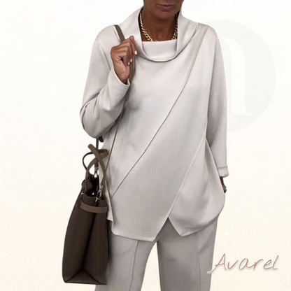 Elegante unregelmässig länge Ärmligi Drapierte Krage für e stilvolle Look