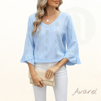 Stilvolls Oberteil mit Rautenkaromuster, elegante Hoaldetails und trendy Trompetenärmel