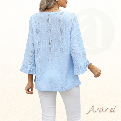 Stilvolls Oberteil mit Rautenkaromuster, elegante Hoaldetails und trendy Trompetenärmel