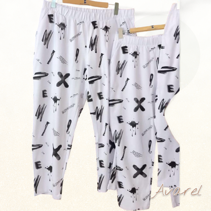 lässigi halbhöch Hosen mit stilvolle Druck für e trendige Look