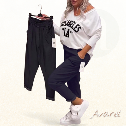 Bequemi, stylisch eiwäbigi Hose mit praktsche Täsche für de Alltag