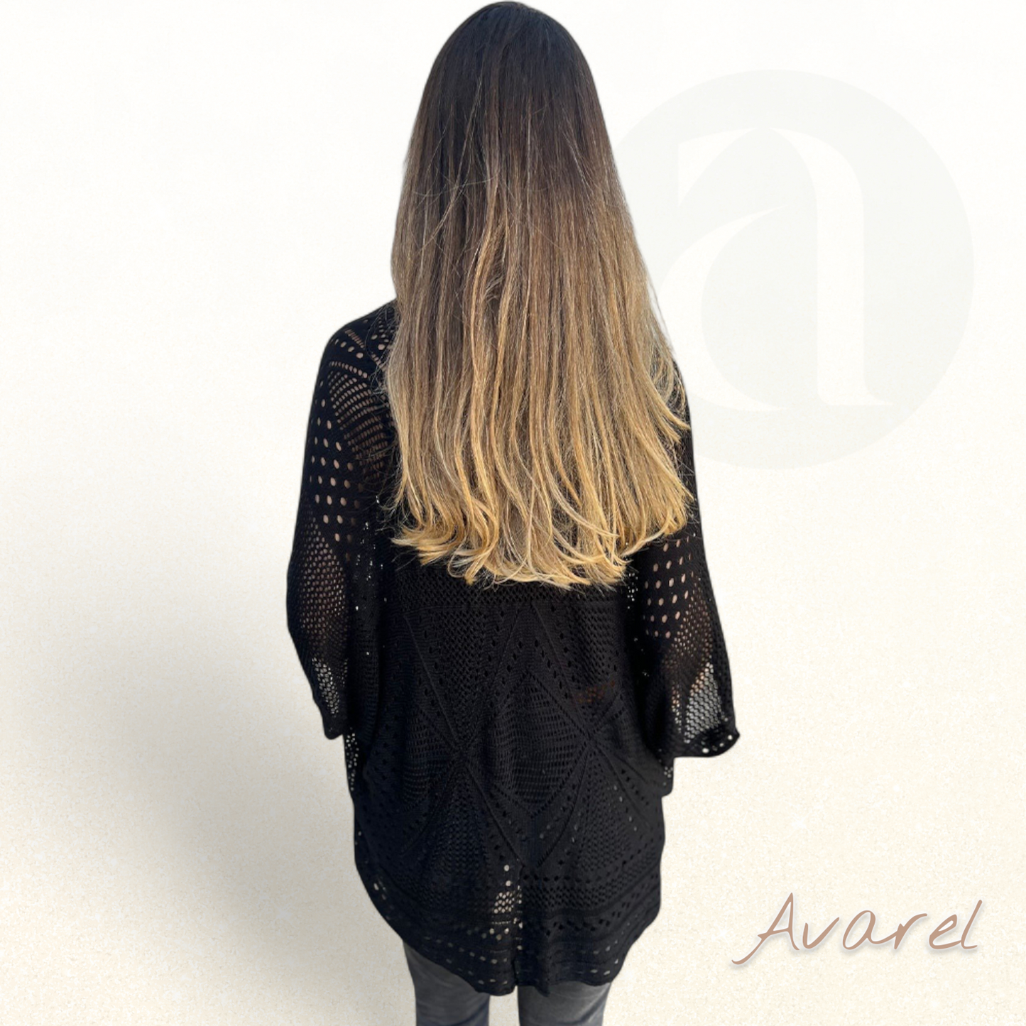 Stilvolle Mantel im Lochstrick-Muster für en elegante Look