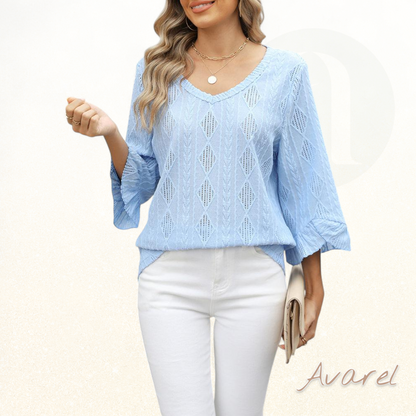 Stilvolls Oberteil mit Rautenkaromuster, elegante Hoaldetails und trendy Trompetenärmel