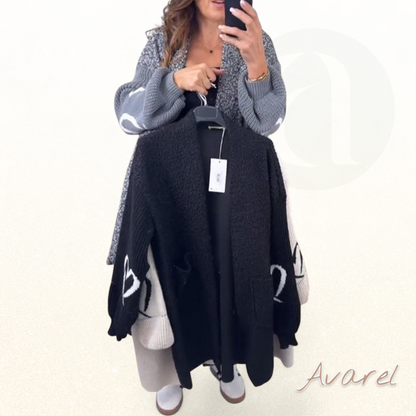 Eleganter wärmender Mantel mit stylischer Täsch für de perfekte Look