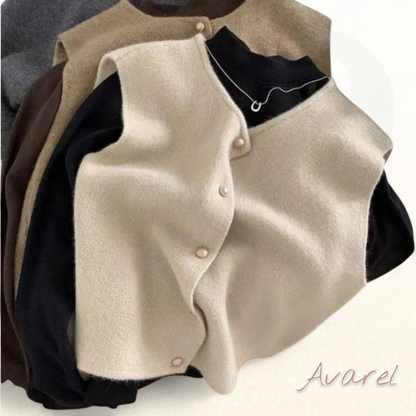 Ärmelloses Chüeli aus leigem und eleganter Federmaterial für Frau - Die perfekte Wahl für's Frühling