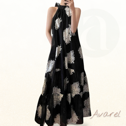 Stilvolles schwarzes Baumwollkleid mit einzigartigen Schulterseiten – Perfekt für einen eleganten Sommerlook