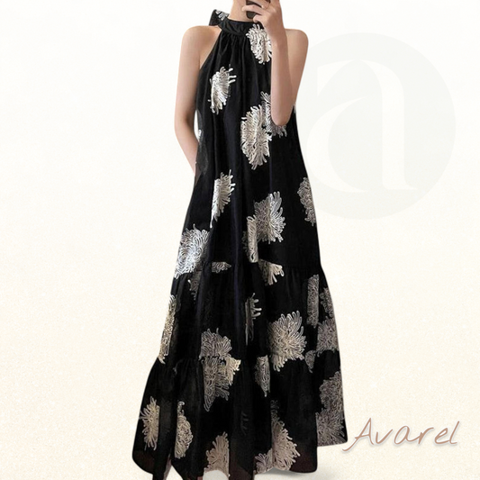 Stilvolles schwarzes Baumwollkleid mit einzigartigen Schulterseiten – Perfekt für einen eleganten Sommerlook