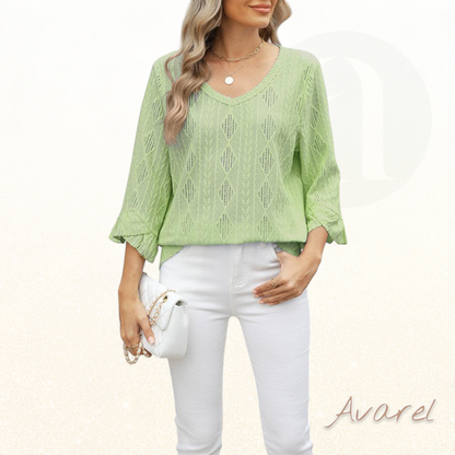 Stilvolls Oberteil mit Rautenkaromuster, elegante Hoaldetails und trendy Trompetenärmel